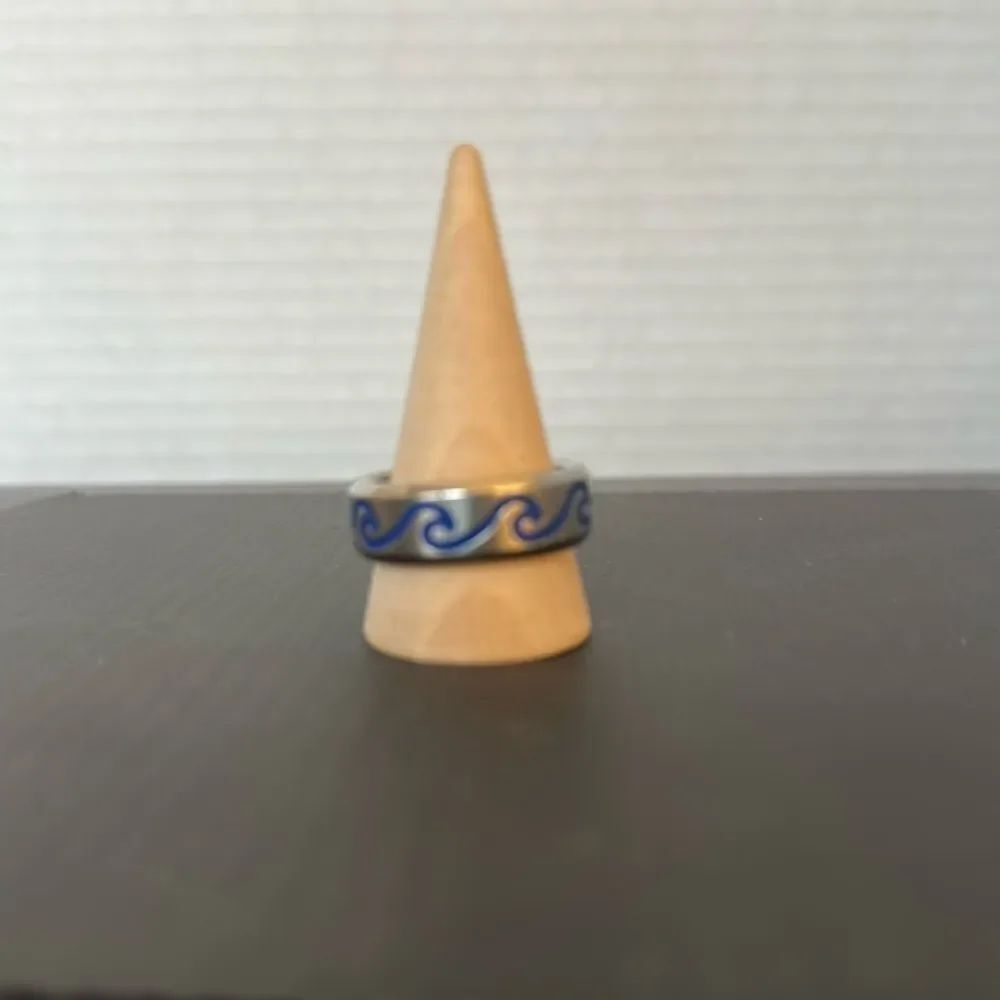 Stainless steel blue wave cut ring